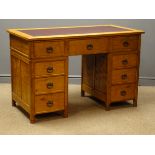 'Acornman' oak twin pedestal desk, adzed panelled sides and drawer fronts, leather inset top,