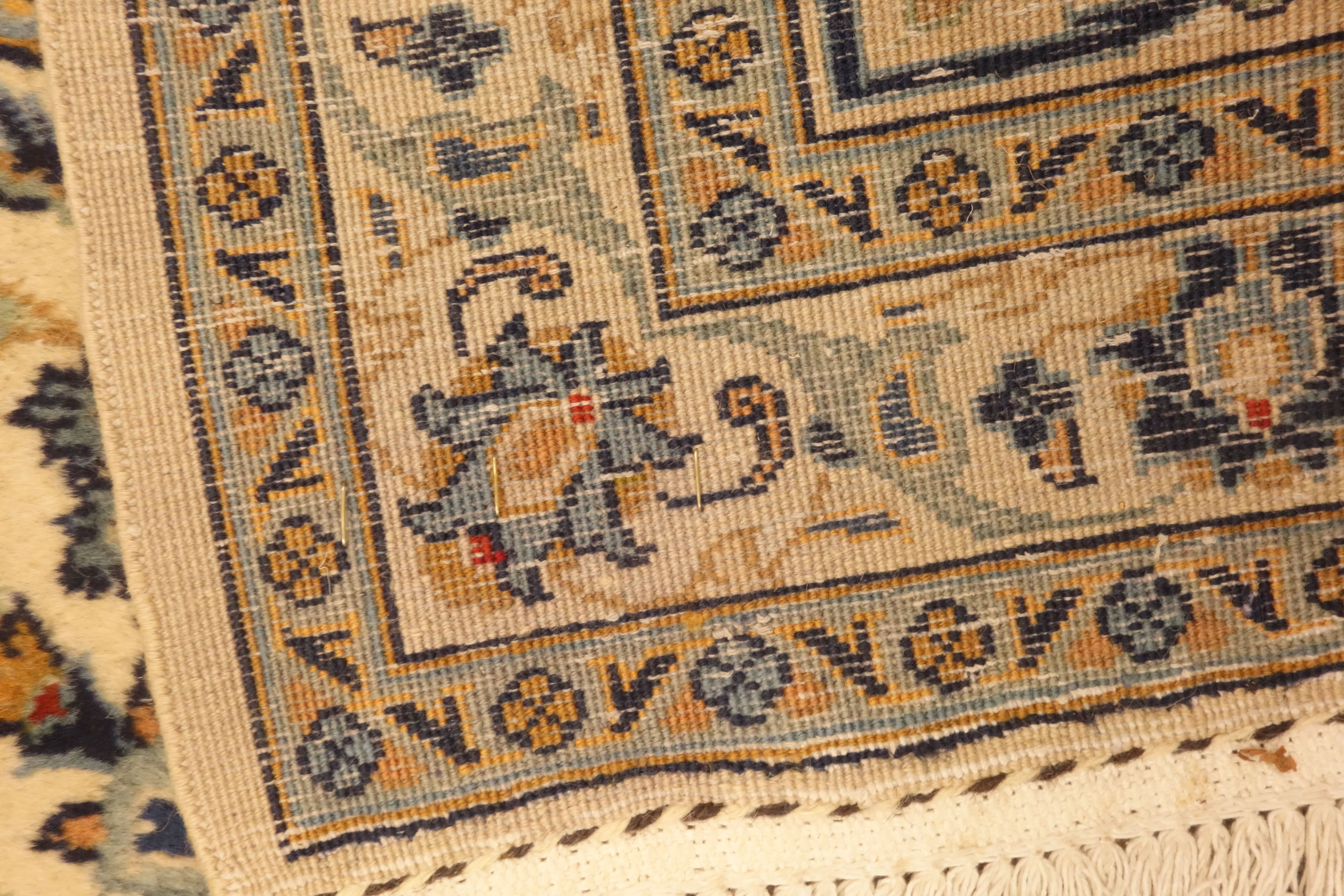 Persian Kashan carpet, ivory ground with blue interlacing overall design, repeating scroll border, - Image 4 of 4