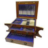 1930's oak and brass bound canteen of silver-plated cutlery for twelve persons,