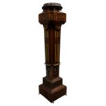 Late Victorian rosewood torchere, with carved and gilt decoration, fluted tapering column,