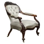 Victorian walnut open armchair,