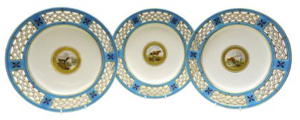Set of three late Victorian Minton cabinet plates hand painted with cattle in a moorland landscape