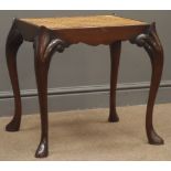 Georgian style walnut bergere rectangular stool, cane work seat with shaped rails,
