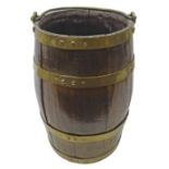 Victorian coopered coal bucket with four brass bands and swing handle,