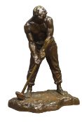 Victor Demanet 'Le Marteleur', a patinated bronze model of a bare chested worker with a hammer,