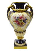 Early 20th century Royal Worcester two handled pedestal vase, hand painted with floral sprays by E.