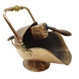 Victorian copper helmet shaped coal scuttle, with faceted amber glass handle & shovel,