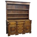 19th century oak dresser, raised three tier plate rack with turned half column uprights,