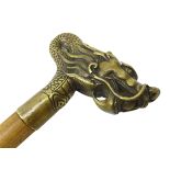 20th century hardwood walking cane, the brass pommel cast as a dragon,