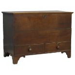 George lll oak mule chest with hinged top and interior candle box above two cockbeaded drawers with