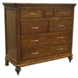 Quality reproduction walnut chest, five shot and two long drawers, oak lined, turned feet, W126cm,