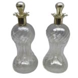 Pair Victorian silver mounted decanters of pinched waisted form by Henry Matthews,