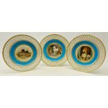 Set of three late Victorian Minton cabinet plates hand painted with Dog groups after Edwin Landseer,