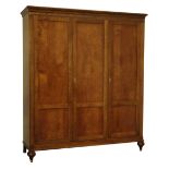 Quality reproduction walnut triple wardrobe, projecting cornice above dentil frieze,