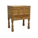 'Mouseman' panelled adzed oak sewing workbox with hinged top, and single fitted drawer,