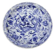 Chinese blue & white circular waved edge dish, decorated with three clawed Dragon Chasing Pearl,