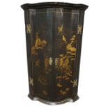 19th century serpentine corner cupboard, Chinoiserie decorated with figures in gilt,