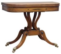 Regency mahogany card table, fold over swivel top with rosewood banding and scrolled inlay,