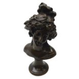 Patinated bronze bust of a maiden on waisted plinth,