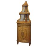 19th century gilt metal mounted figured satinwood standing corner cabinet with graduating twin