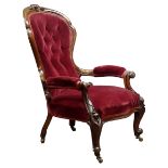 Victorian walnut framed open armchair, upholstered back seat and arms in red velvet,