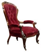 Victorian walnut framed open armchair, upholstered back seat and arms in red velvet,