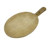 'Mouseman' oval adzed oak Cheese Board, curved handle with relief carved mouse signature,