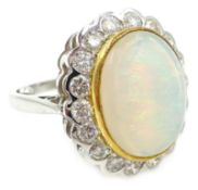 Opal and diamond white gold cluster ring hallmarked 18ct Condition Report Approx 9.