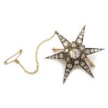 Victorian gold diamond star brooch/pendant, central diamond approx 0.