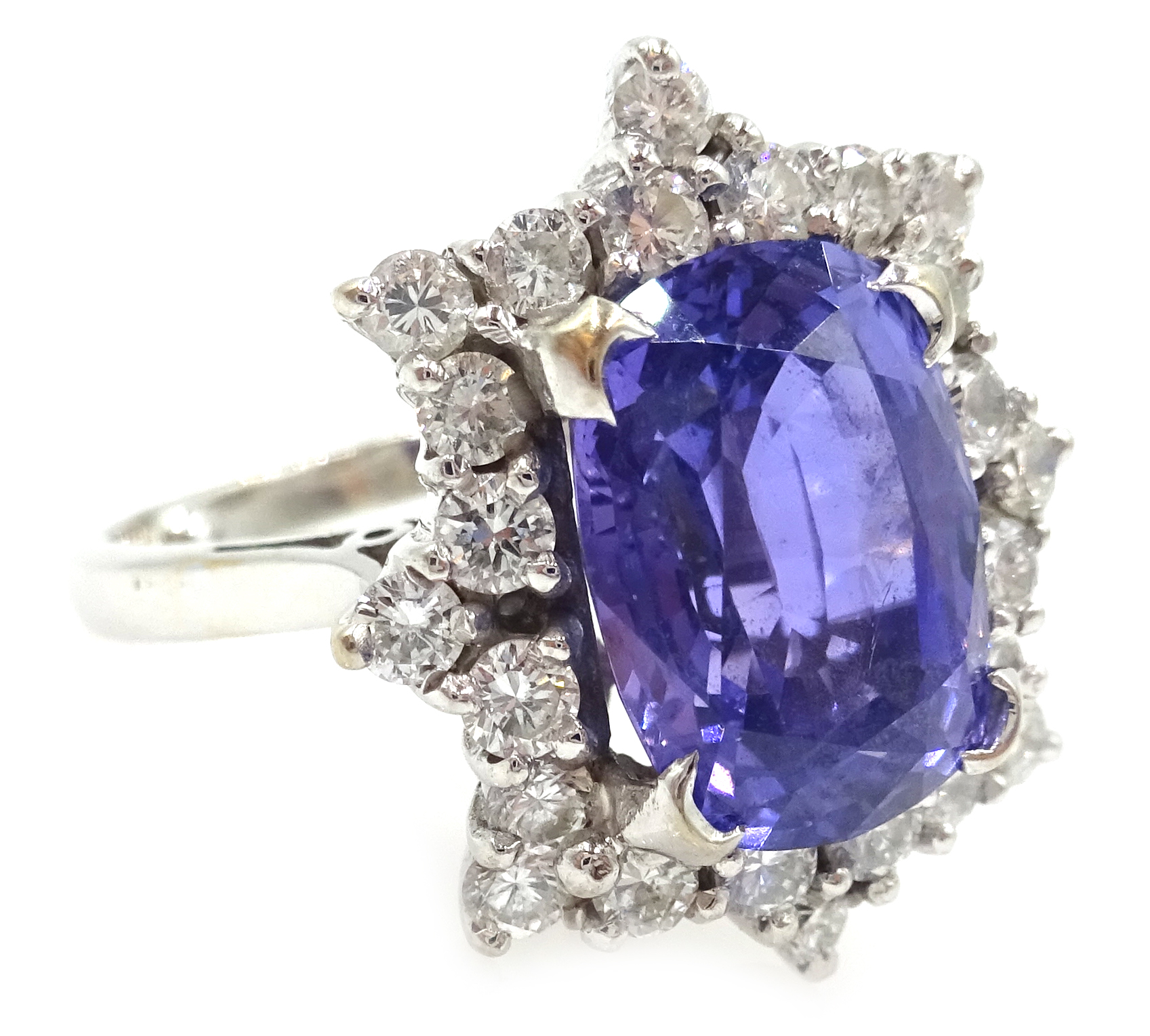 White gold emerald cut purple sapphire and diamond cluster ring,