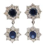 Pair of 18ct gold white gold sapphire and diamond double cluster pendant ear-rings,