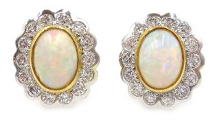 Pair of 18ct gold opal and diamond cluster stud ear-rings Condition Report Gold