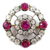 Ruby and diamond circular brooch with cluster centre, rubies approx 3.4 carat, diamonds approx 4.