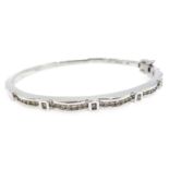 White gold scallop edge, channel set diamond hinged bangle,