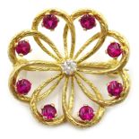 Ruby and diamond 18ct gold openwork flower brooch,