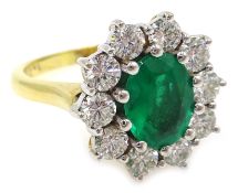 Emerald and diamond cluster ring, hallmarked 18ct Condition Report Emerald 0.8cm x 0.
