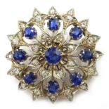 Sapphire and diamond white gold and silver target brooch Condition Report Approx 12.