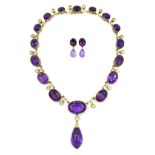 Seventeen stone graduating amethyst and chrysoberyl gold pendant necklace,