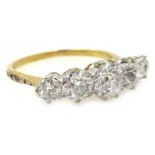 Five stone graduating diamond ring, diamond set shoulders, stamped 18ct Plat,