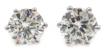 Pair of 18ct white gold diamond stud ear-rings, hallmarked, each diamond approx 0.