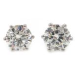 Pair of 18ct white gold diamond stud ear-rings, hallmarked, each diamond approx 0.