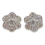 Pair of 18ct white gold flower head stud ear-rings,