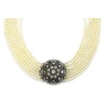 Seven row pearl choker necklace on Edwardian diamond target clasp Condition Report