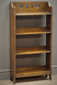 Early 20th century oak two tier bookcase, bead moulding to uprights, fret work back, W46cm, H92cm,