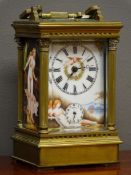 20th century brass alarm carriage clock, painted porcelain dial and panels depicting nude women,