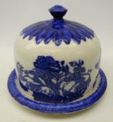 Ironstone style blue and white cheese dome printed with roses,