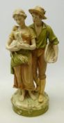 Royal Dux figure of a Shepherd and Shepherdess holding a lamb, no.