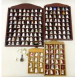 Collection of ceramic thimbles with four display stands Condition Report <a