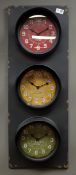 Metal traffic light wall clock, three Quartz clocks for London, New York and Paris,