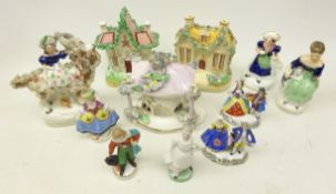 Group of Victorian Staffordshire comprising Pastille burner, money box and cottage,